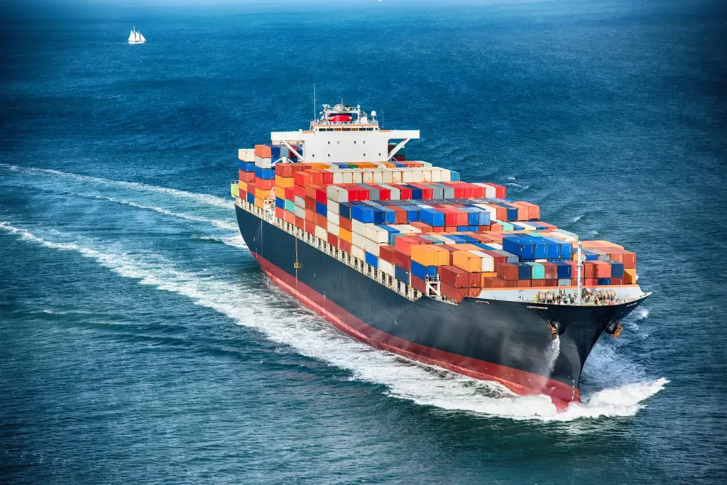 Container vessel across global trade routes Container vessel across global trade routes